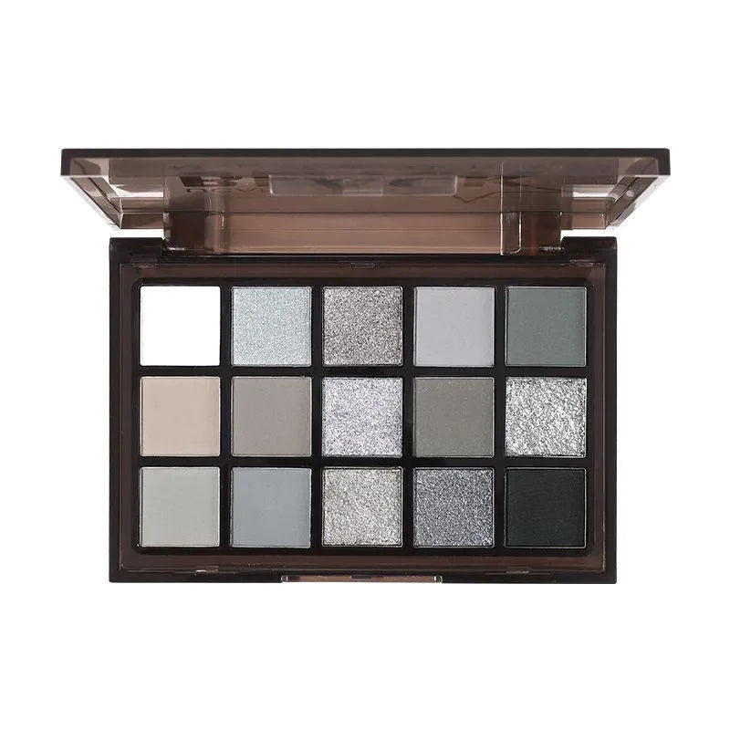 15-colour eye shadow palette showing brown, blue, grey, and black shades with matte and shimmer finishes