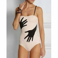 Women's one-piece bikini swimsuit with polyester fabric for beach swimming