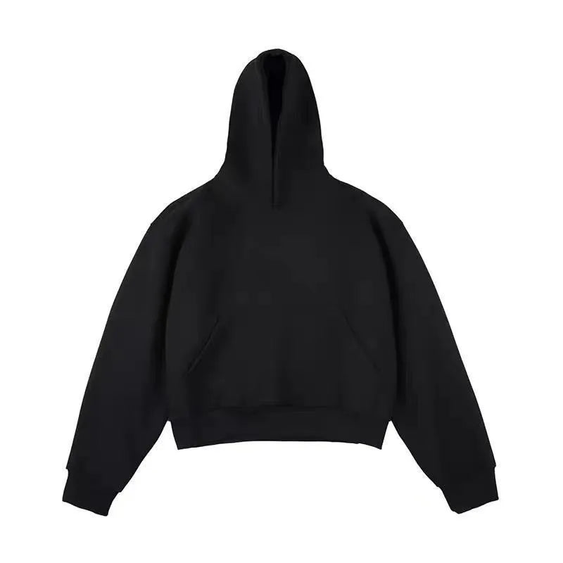 Short black cotton composite velvet hooded sweater with a removable hood on a hanger.