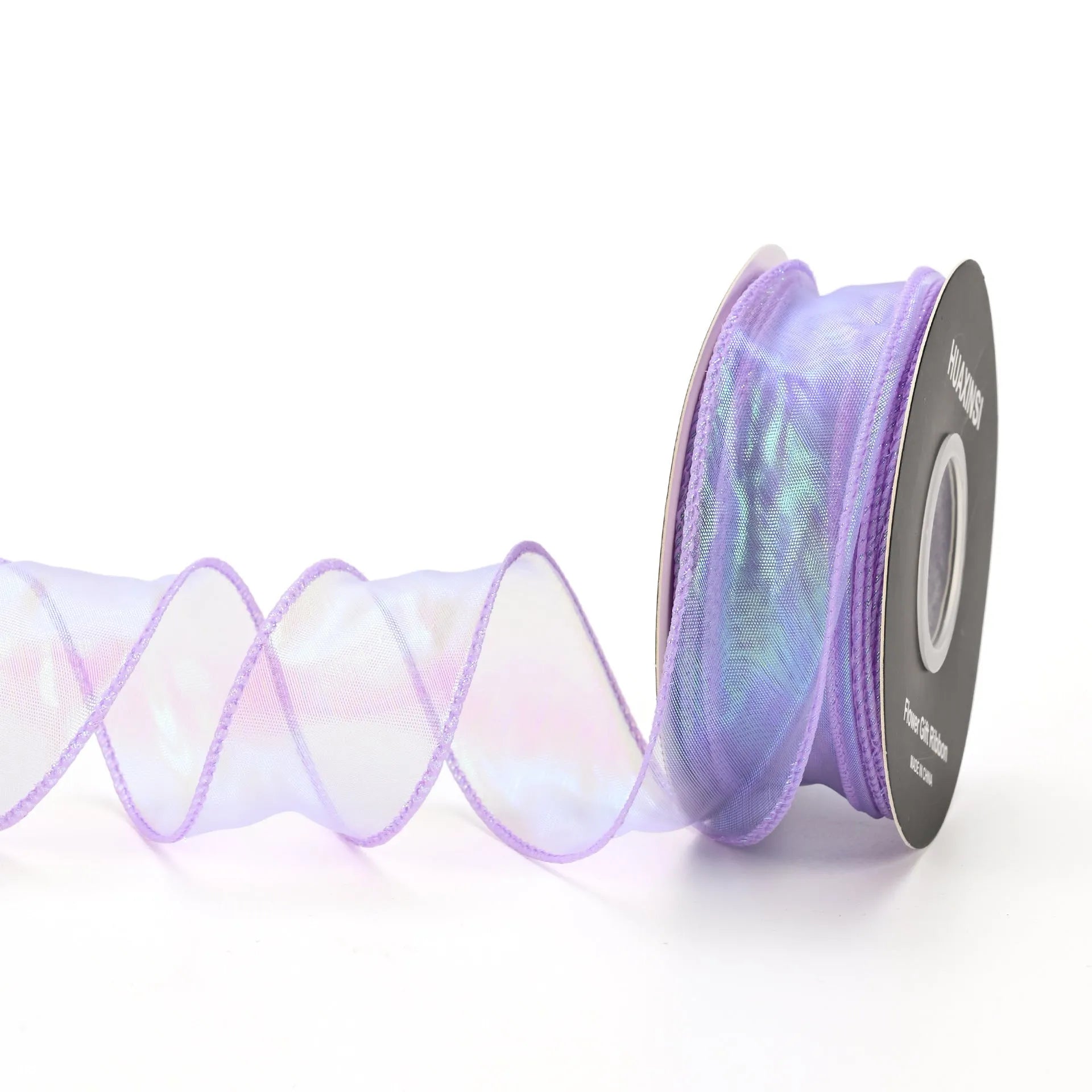 Fishtail yarn ribbon mesh with colourful wave pattern measuring 4cm wide for gift wrapping and decoration