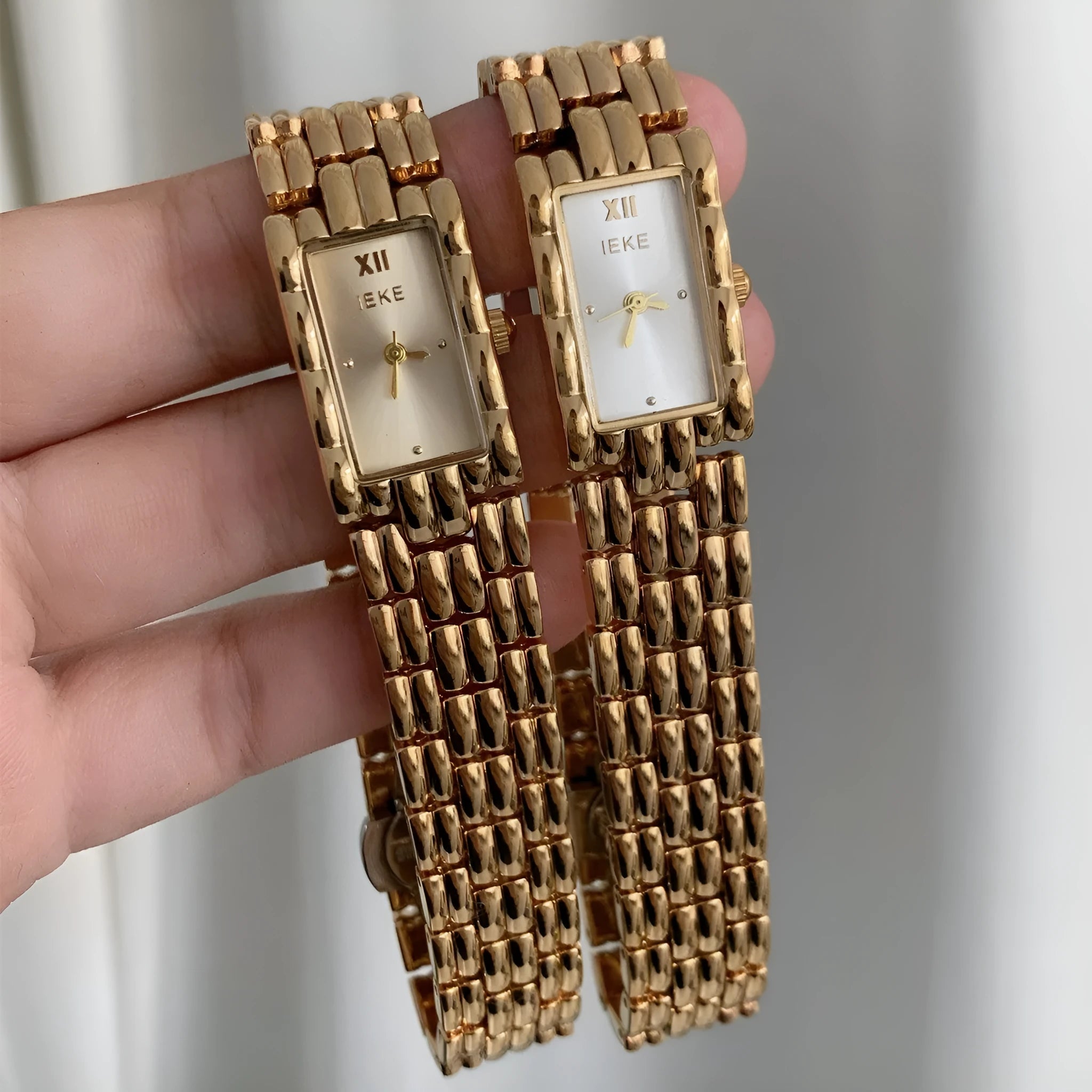 Women's Ins bracelet watch with 15mm dial, butterfly buckle, and silver or gold strap options.