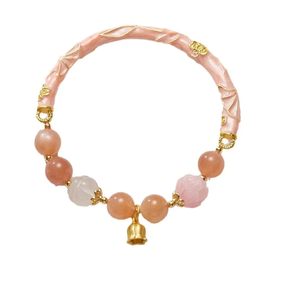 Half-life Liangyuan Lily jade half bracelet with sunstone material and geometric lily pattern