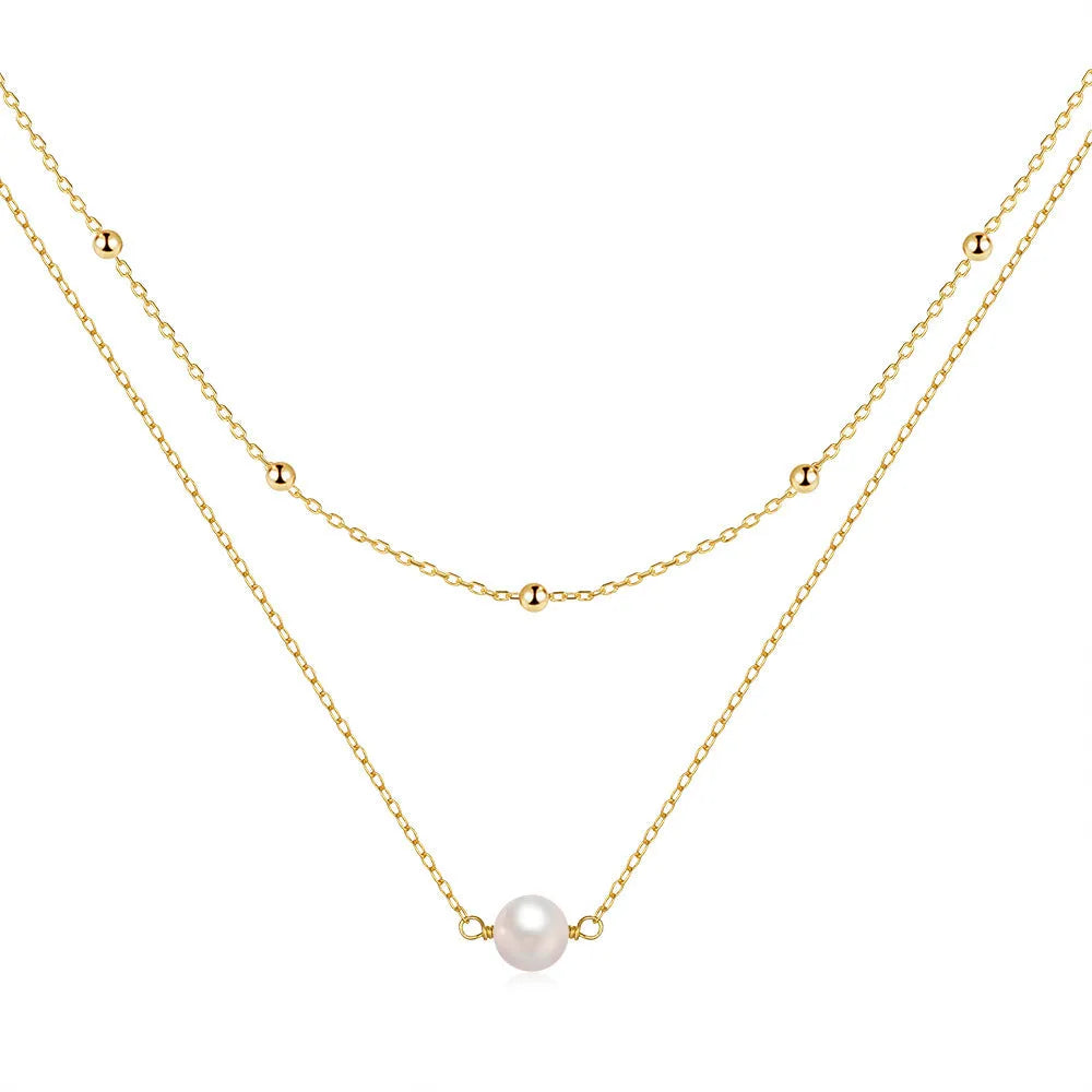S925 sterling silver double layer necklace with twin geometric pearls in gold or white gold plating.