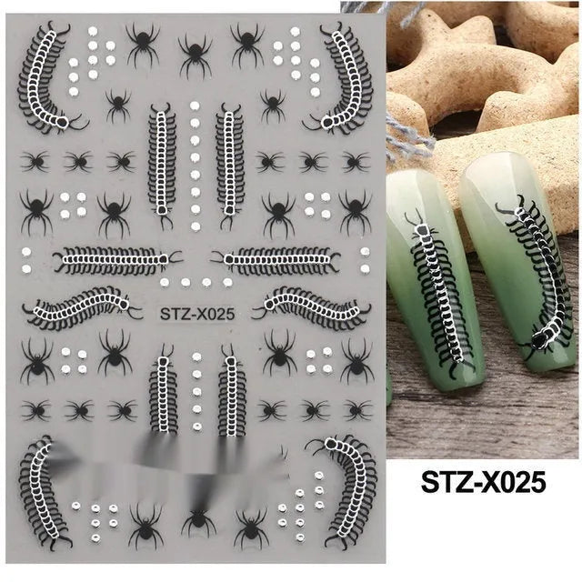 Pack of black and silver strip nail art stickers with cartoon and love pattern designs.