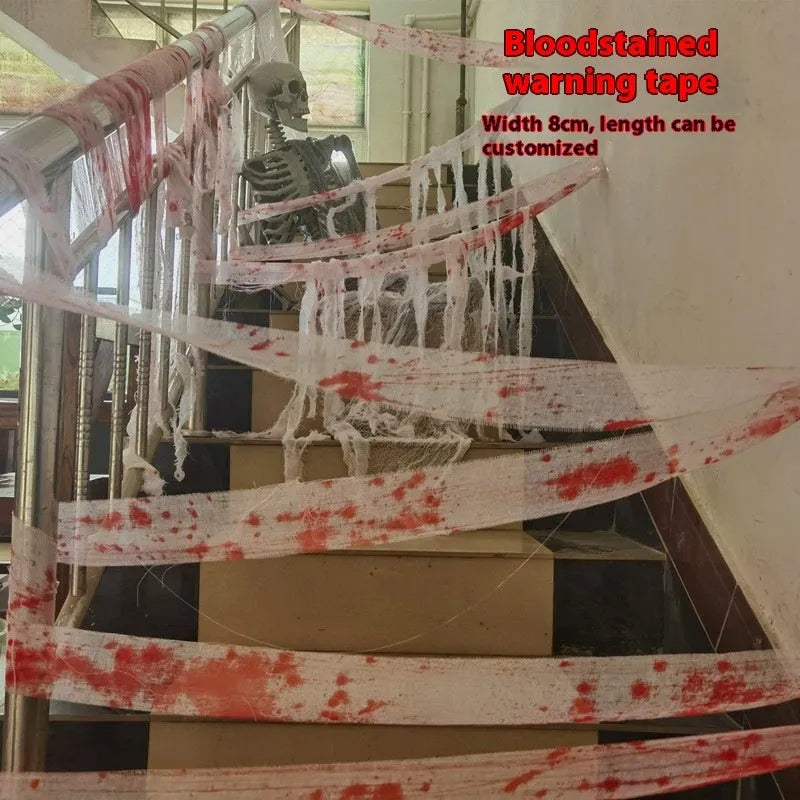 Roll of Halloween horror bandage in bloody red colour with a frayed end, showing its 8cm width and cloth-like polyester texture.