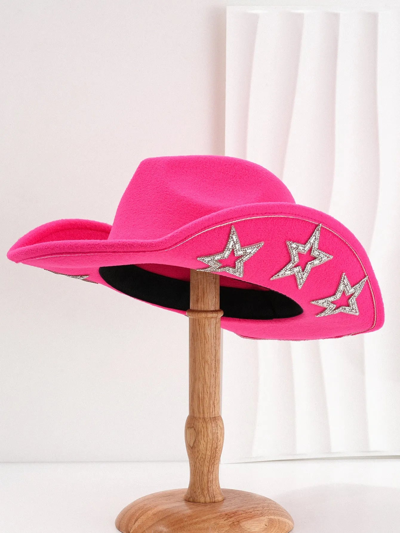 Beige polyester western denim top hat with a conical crown and a silver hexagonal star decoration on the front.