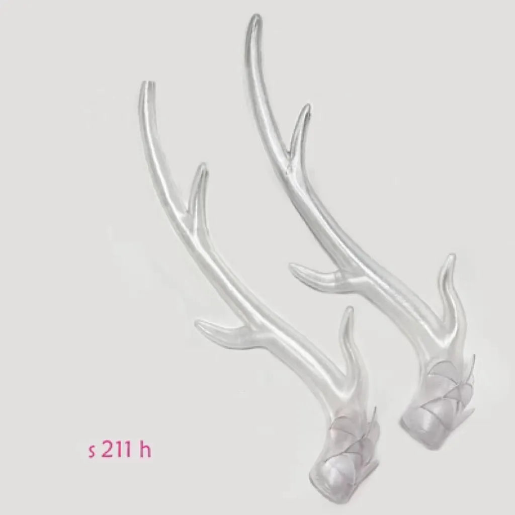 A pair of detailed black resin dragon horn decorations for customising motorcycle and scooter helmets.