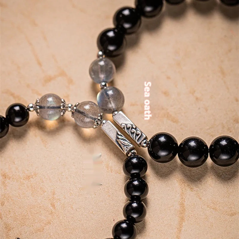 Obsidian Buddha beads couple bracelet DIY set showing 10mm and 8mm bead sizes in national style design