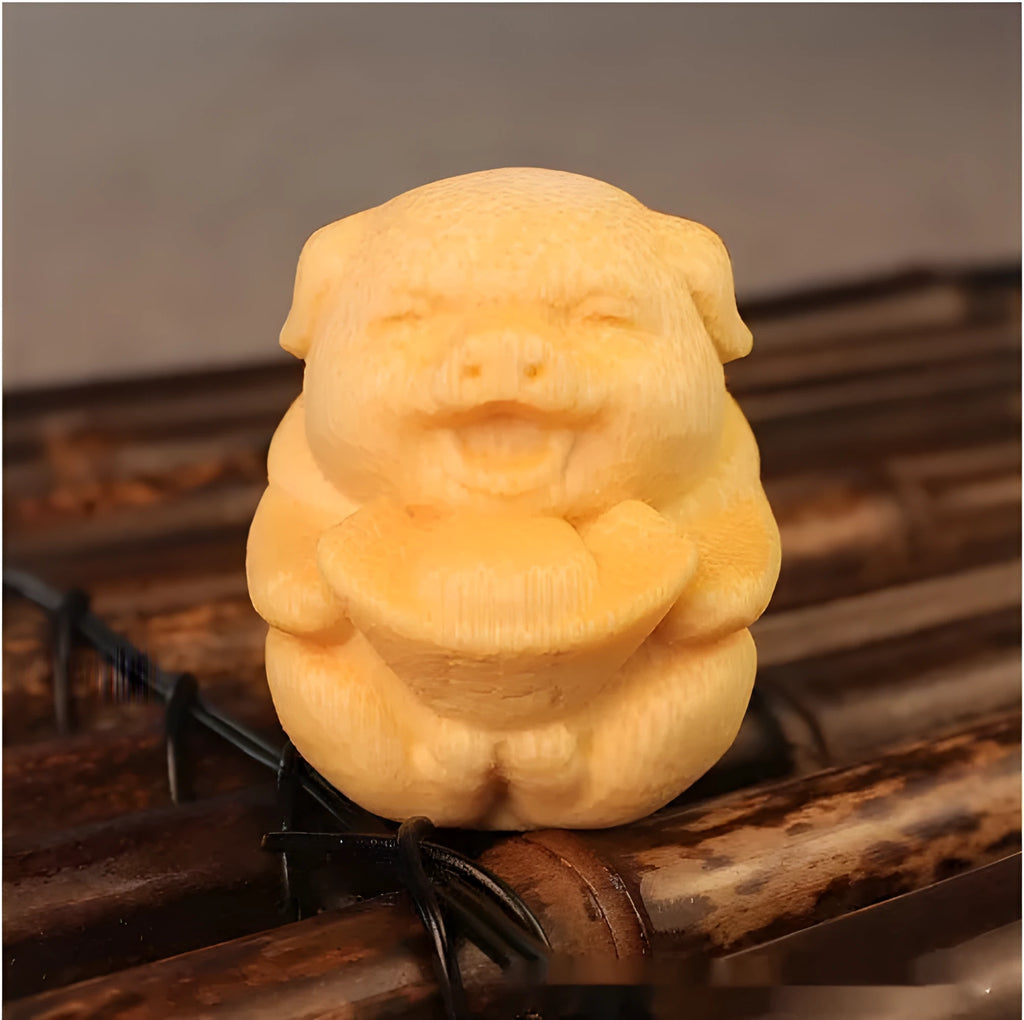 Bamboo pig carving ornament with ingot shape measuring 4cm height and 3.5cm diameter