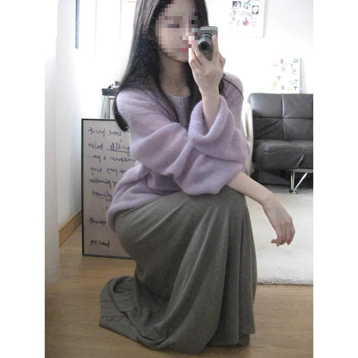 Purple women's blouse with hollow out pattern and princess sleeves on mannequin