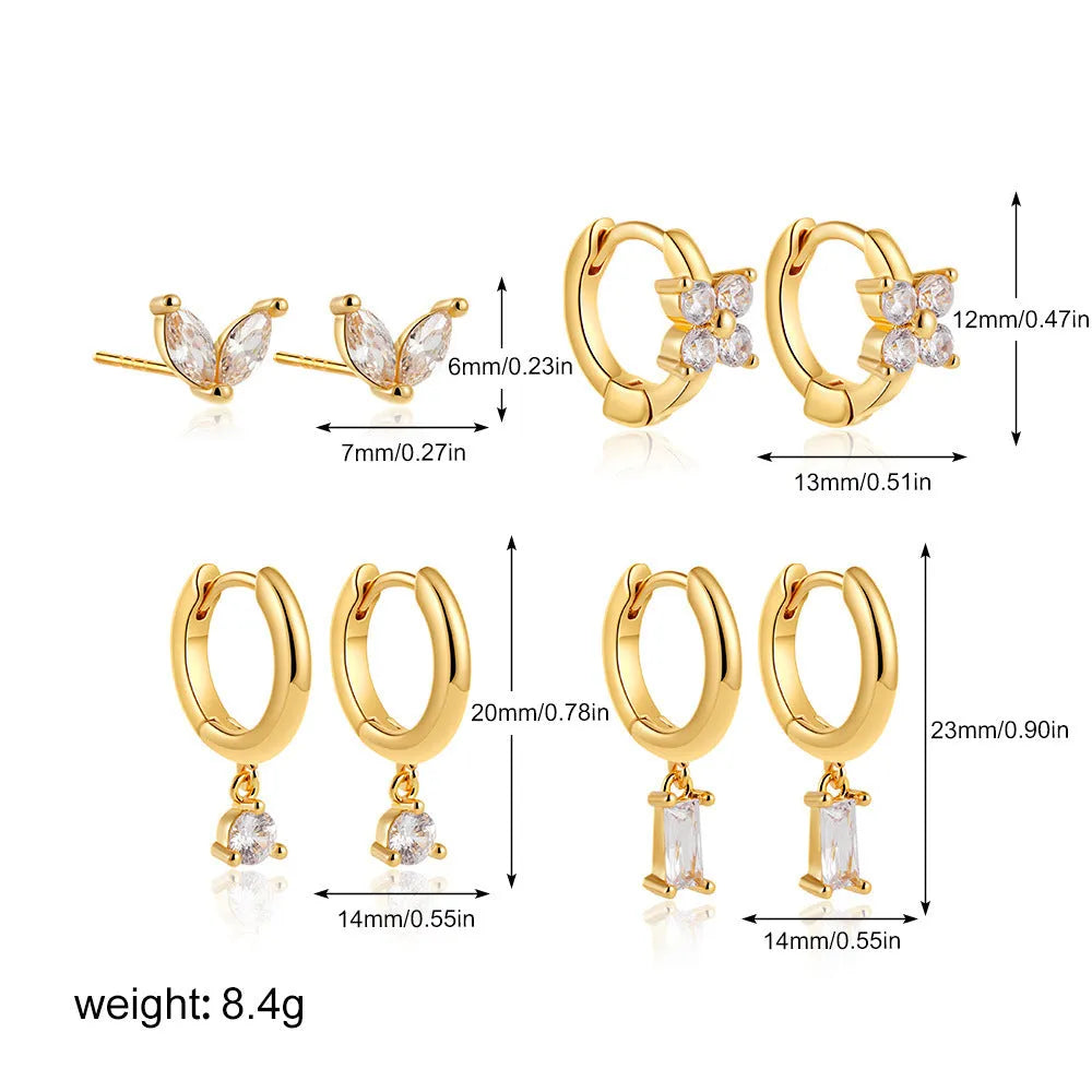 Geometric copper earring set with gold electroplated finish showing star and square shapes