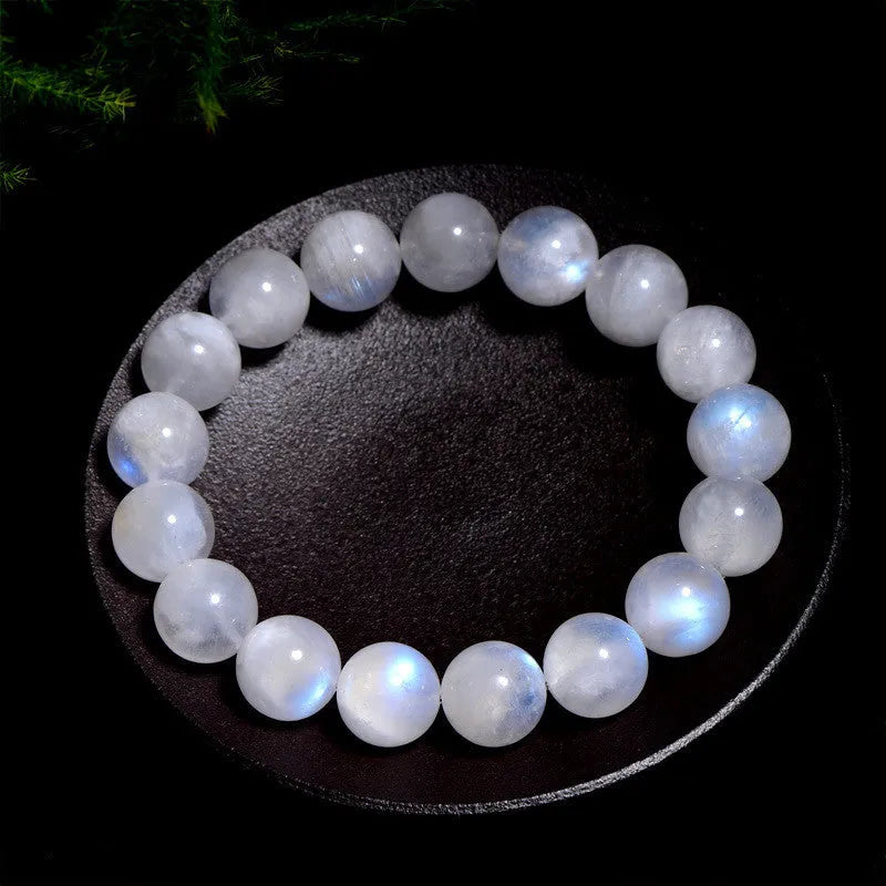 Natural moonstone round bead bracelet showing white blue moonlight colour