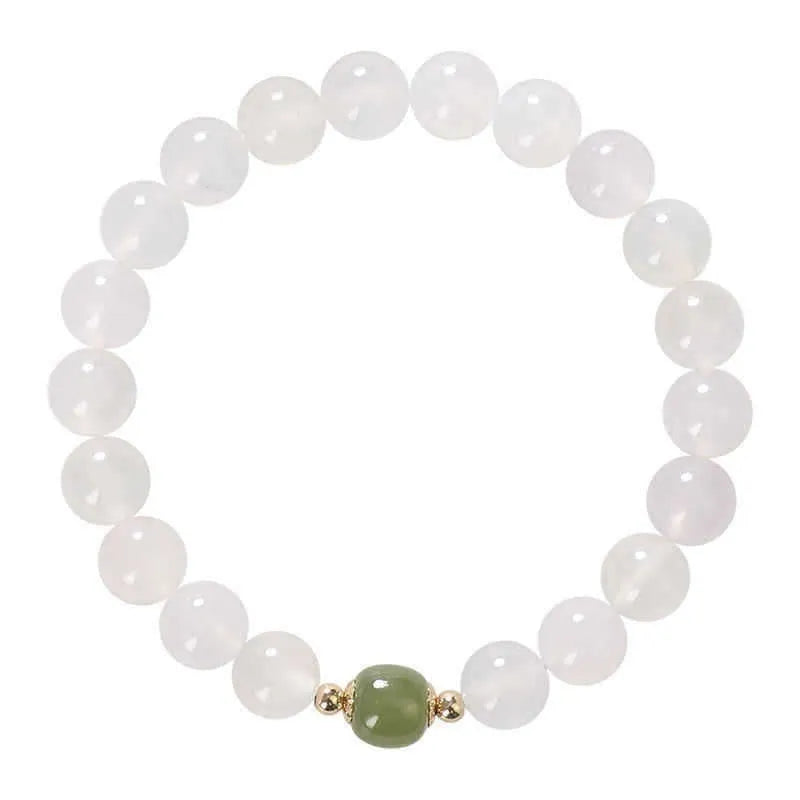 Handmade white agate and hetian jade bracelet with red cinnabar inlay forming text, shown in 6mm and 8mm bead sizes.