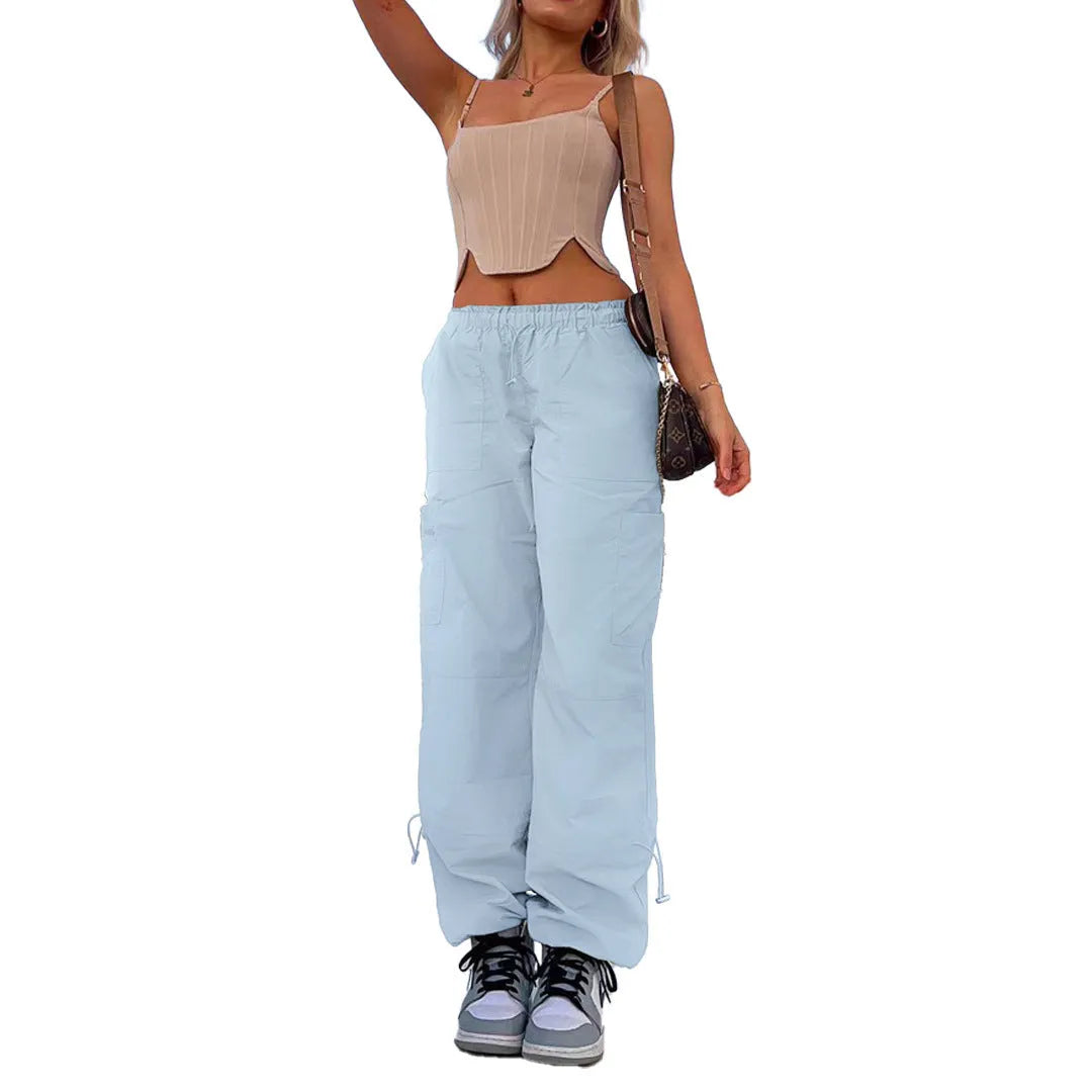 Multi-pocket cargo casual pants in a loose fit, shown in a neutral colour like grey or khaki.