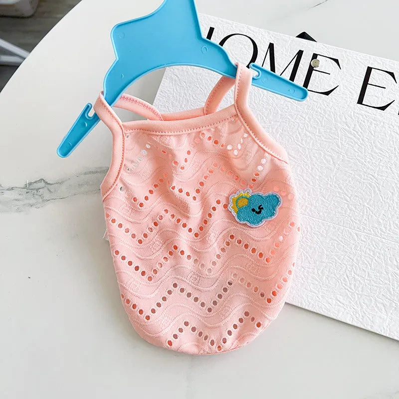 Light blue pet cooling vest with mesh straps on a mannequin, showing camisole-style cut.