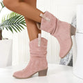 Women's suede mid-calf boots with chunky rubber sole in lotus root colour showing leather stitch detailing
