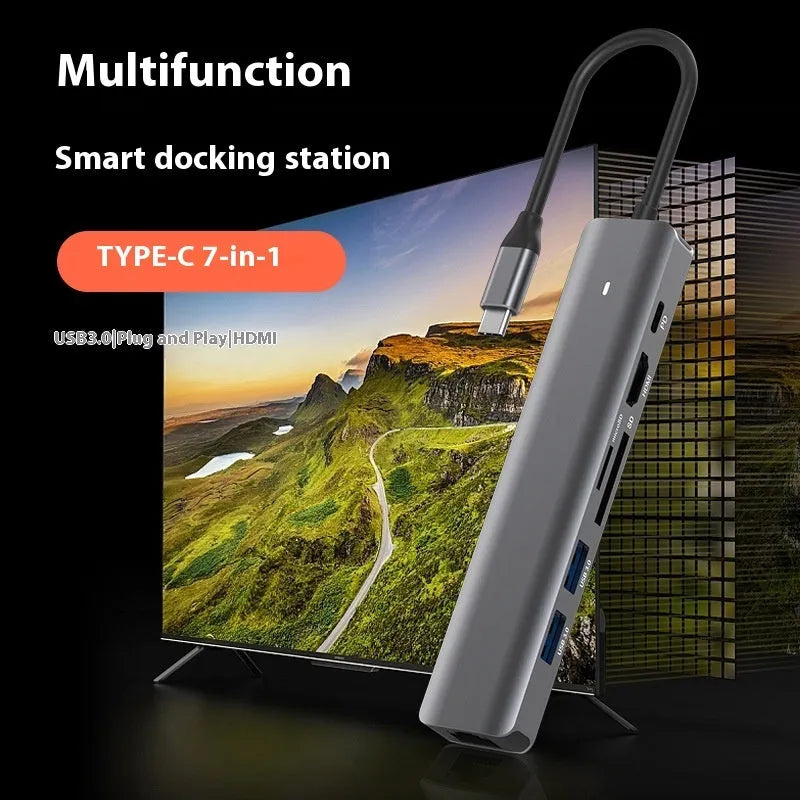 LQT-LH07 7-in-1 USB-C hub with card reader slots and multiple ports on a dark background.