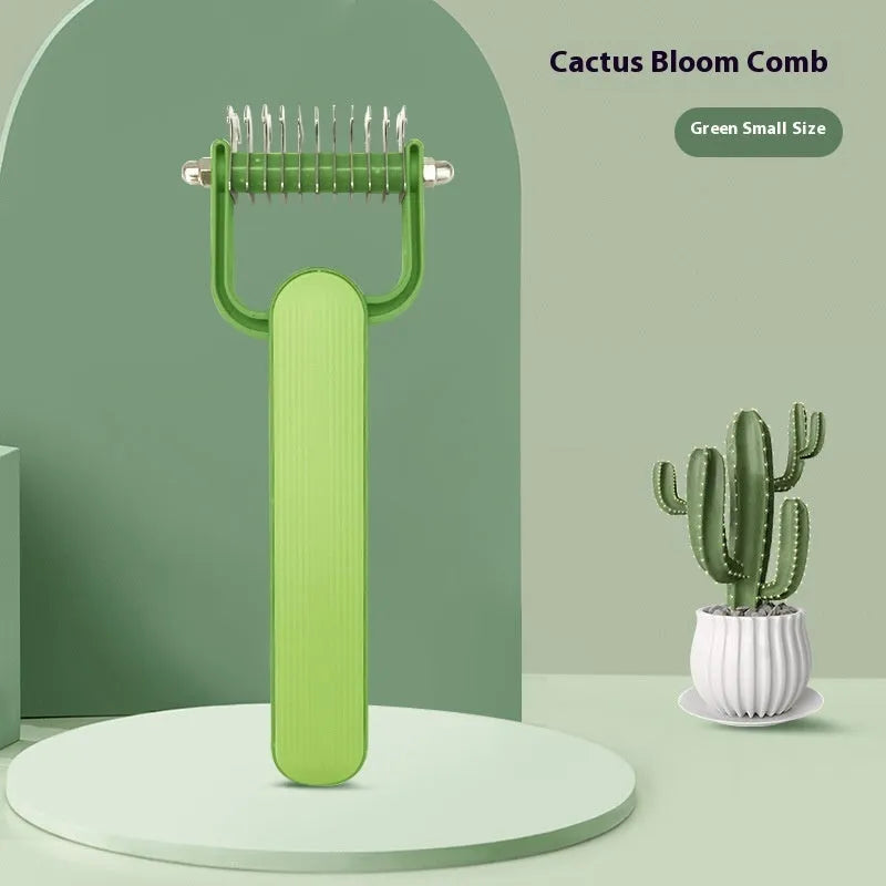 Green and grey dog grooming comb with stainless steel teeth for removing mats and tangles.