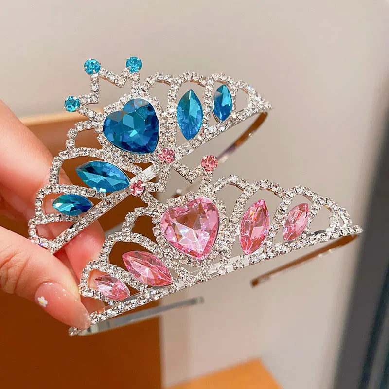 Children's electroplated alloy metal headband with crown shape and crystal decoration in pink, blue, or purple.