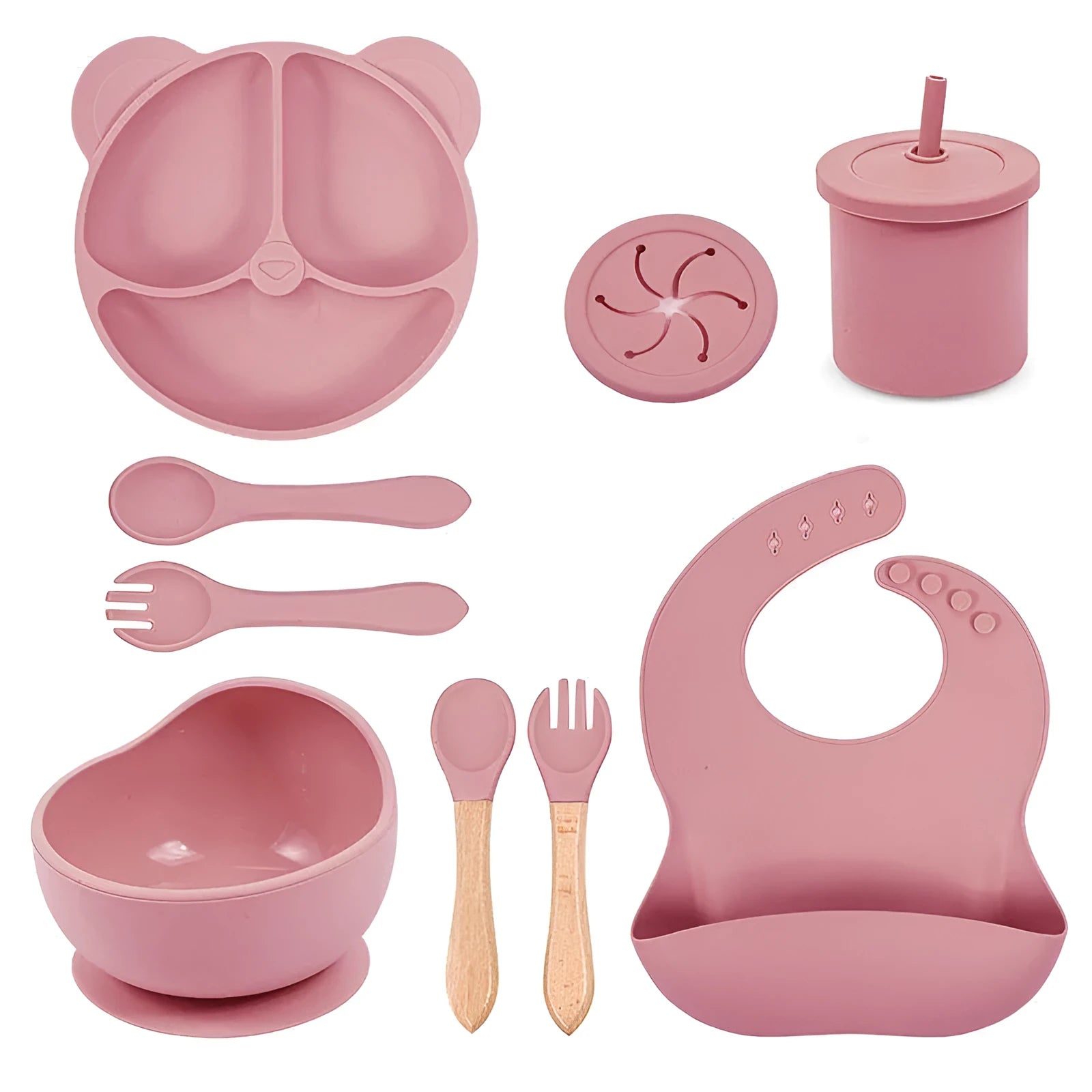 Children's silicone tableware set with cat ear cup in beige, blue and other colours on a table