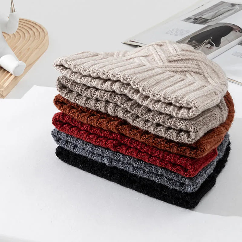 Wool knitted dome crown winter hat for women in six colour options showing totem detailing