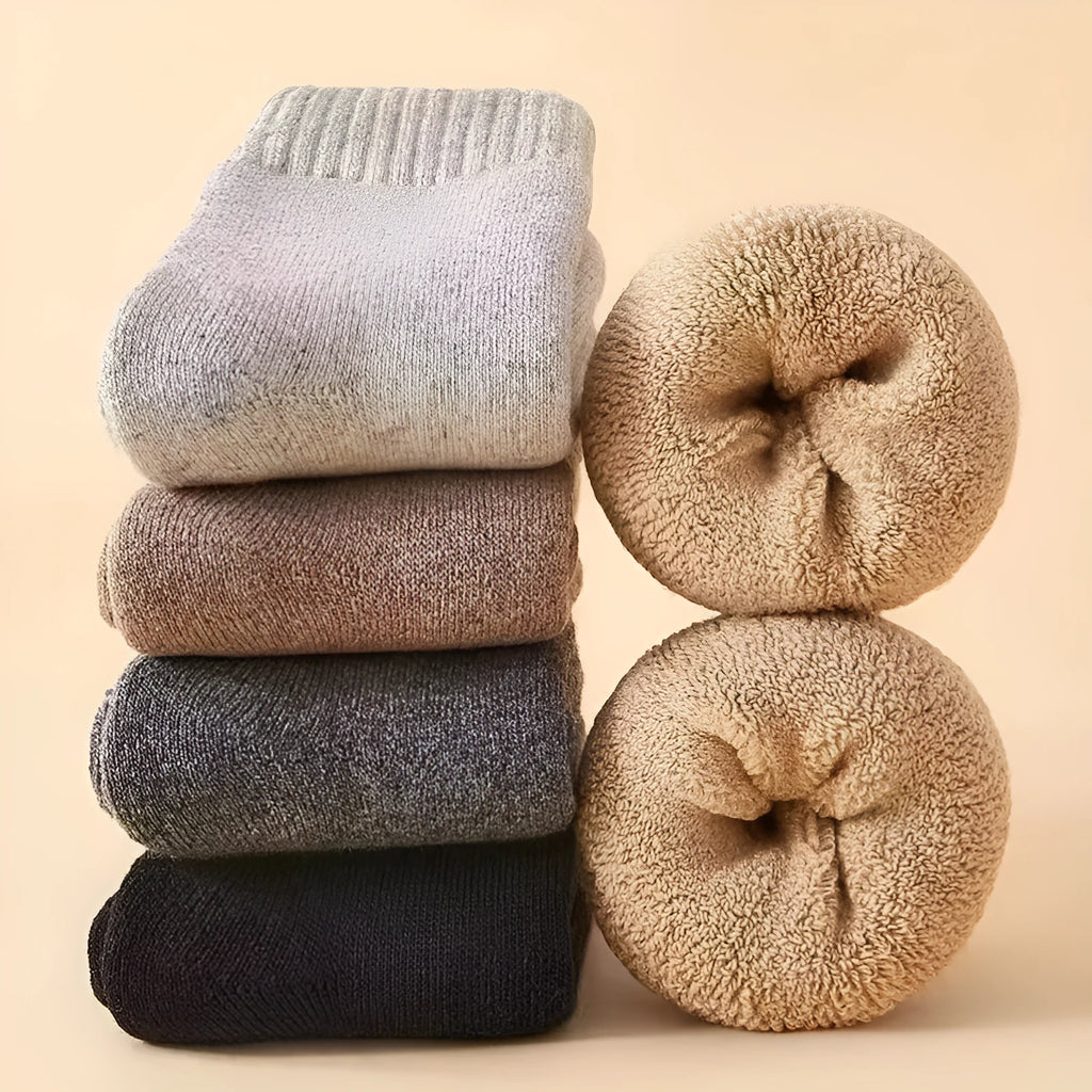 Winter wool socks with thick merino midsole in four solid colour options showing packaging