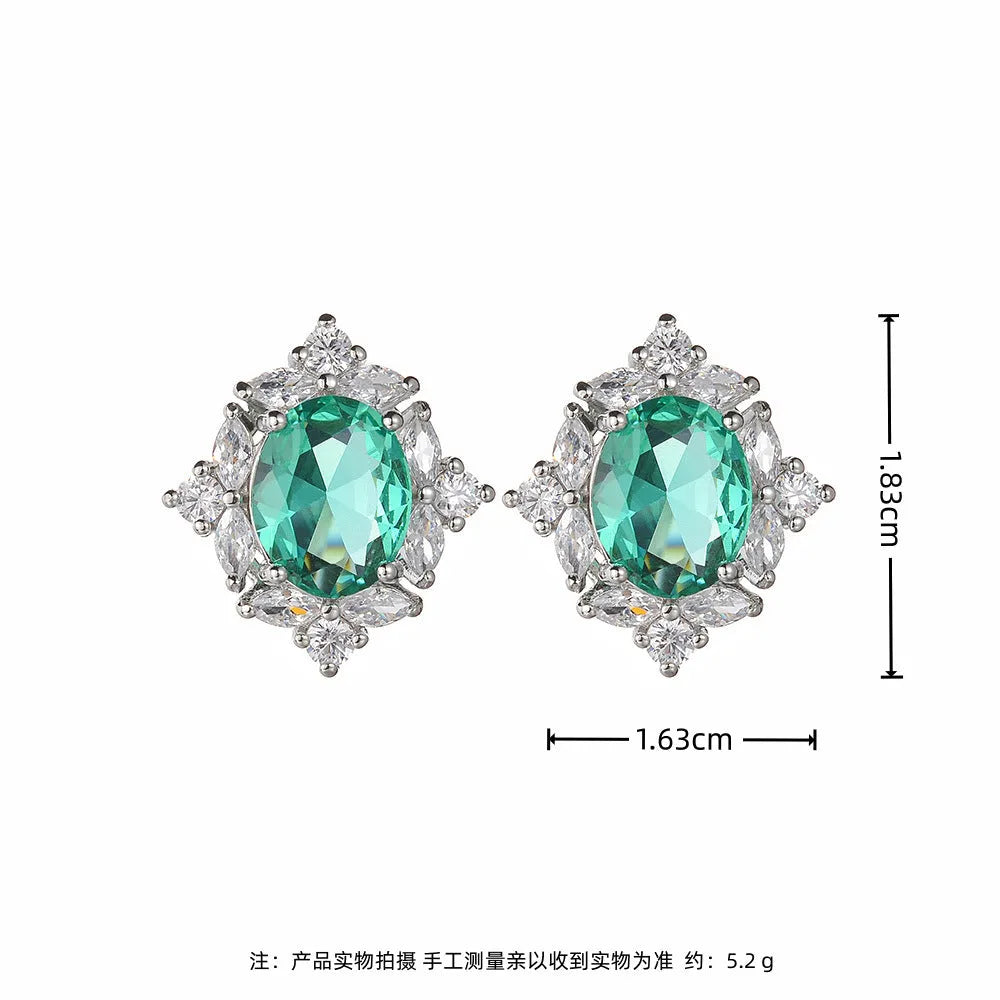 Retro copper oval clip-on earrings with green coloured gem and zircon inlay