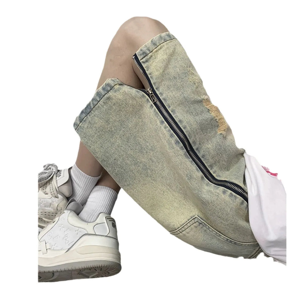 Blue retro denim shorts for men with ripped detail, loose five-points fit, and button fly closure.