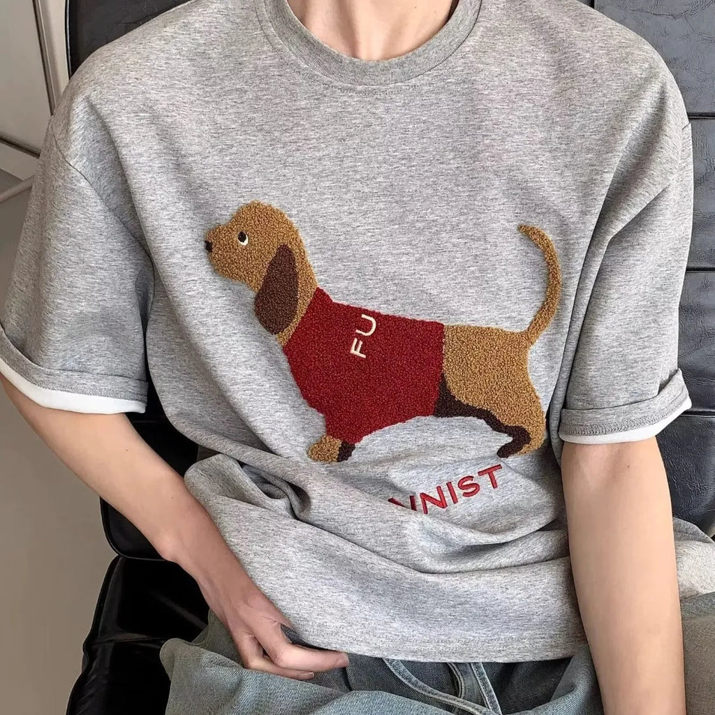 Men's grey cotton T-shirt with an embroidered sausage dog design on the front.