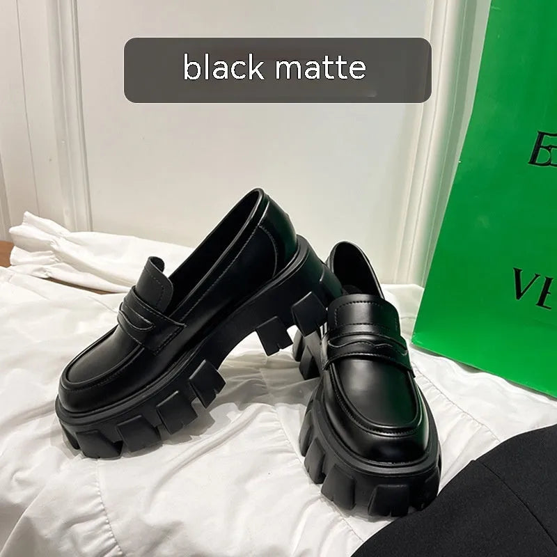 British style wide fit loafers in patent leather with a muffin base heel and rubber sole