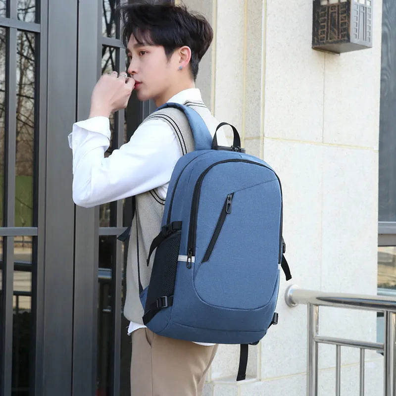 Blue Oxford cloth computer backpack for travel with laptop compartment.