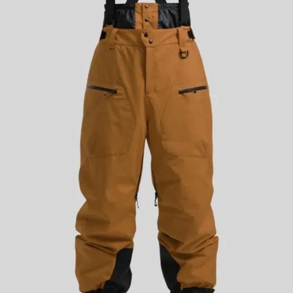 Men's black waterproof ski trousers with adjustable ankle straps on a model