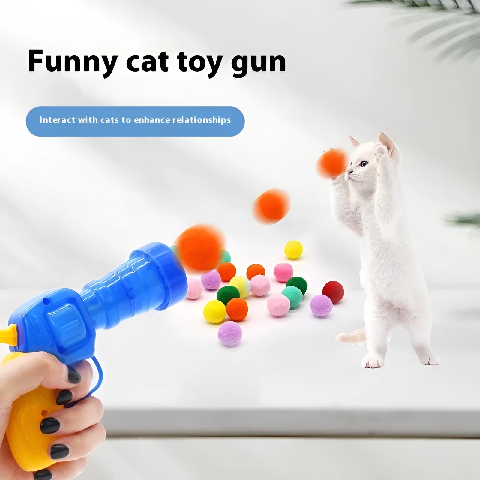 Interactive pet toy gun with plush yarn balls for dogs and cats indoor play