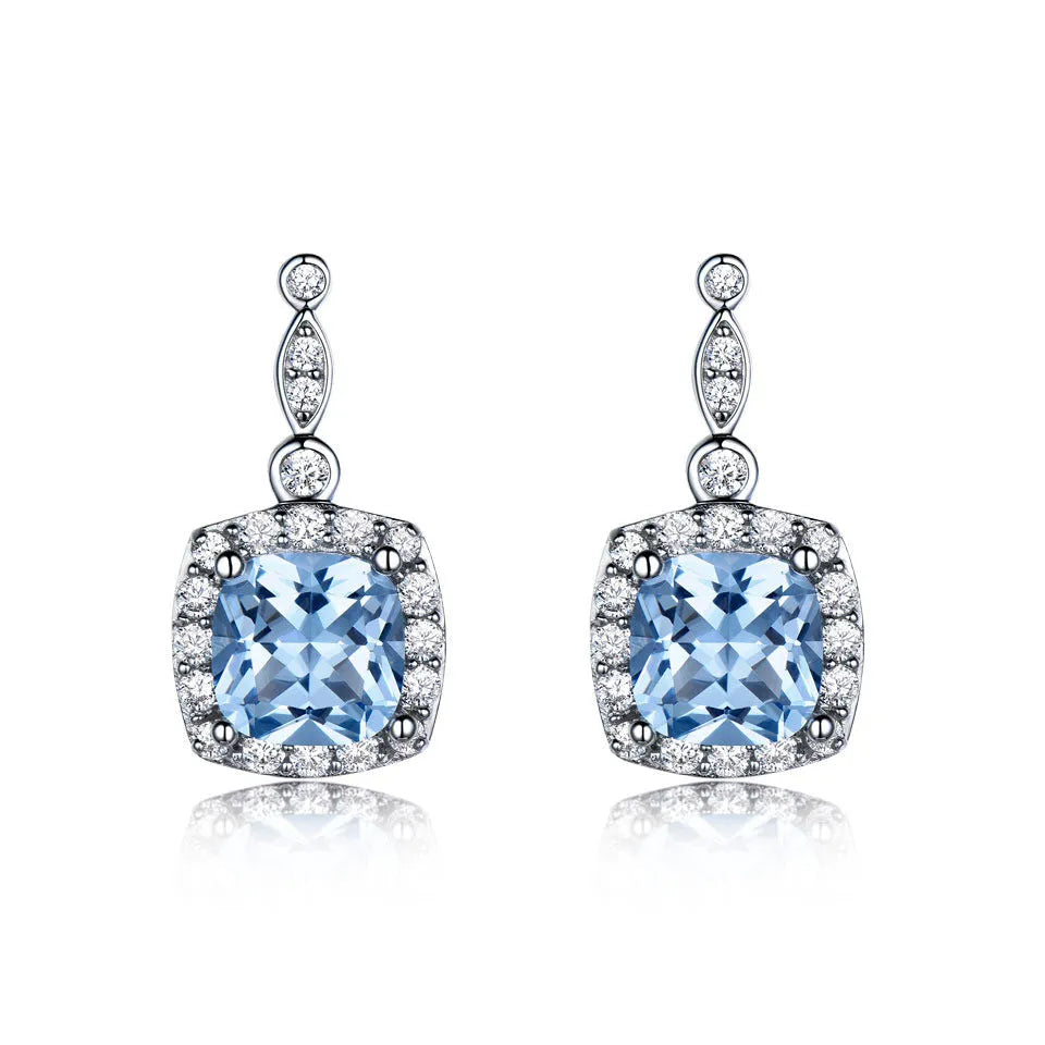 925 sterling silver jewellery set with sky blue topaz stones, including necklace, bracelet and earrings
