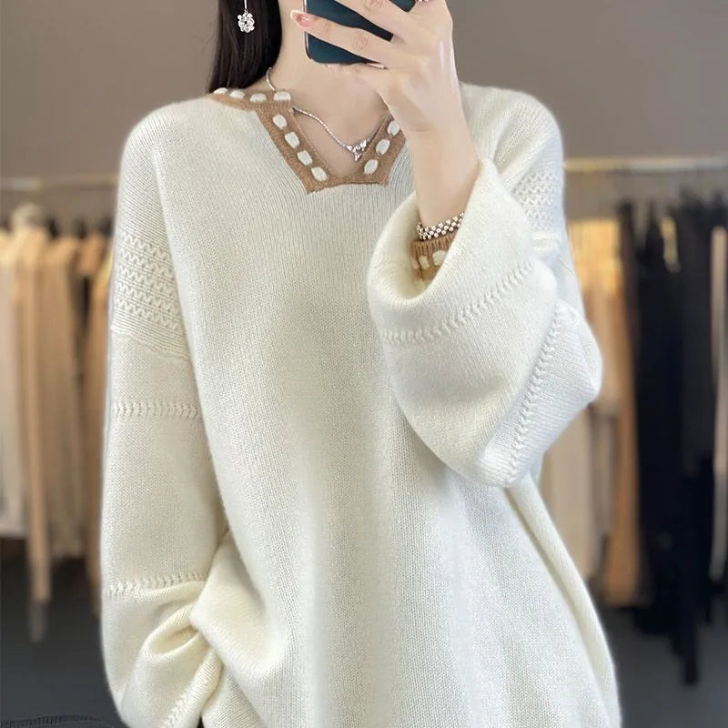Women's V-neck pullover sweater in camel colour showing regular long sleeves and pullover construction