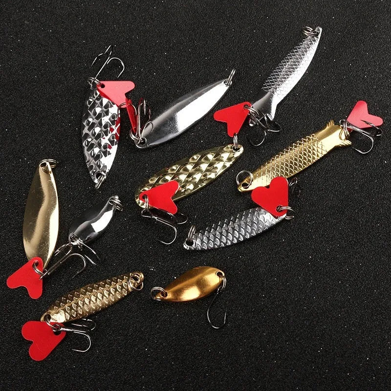 Pineapple Sequin Box containing gold and silver metal sequins for fishing lure building.