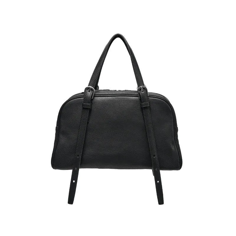 Women's genuine leather retro shoulder bag in horizontal square shape with double straps.