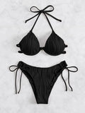 Women's black bikini swimsuit with steel underwire support on a mannequin.