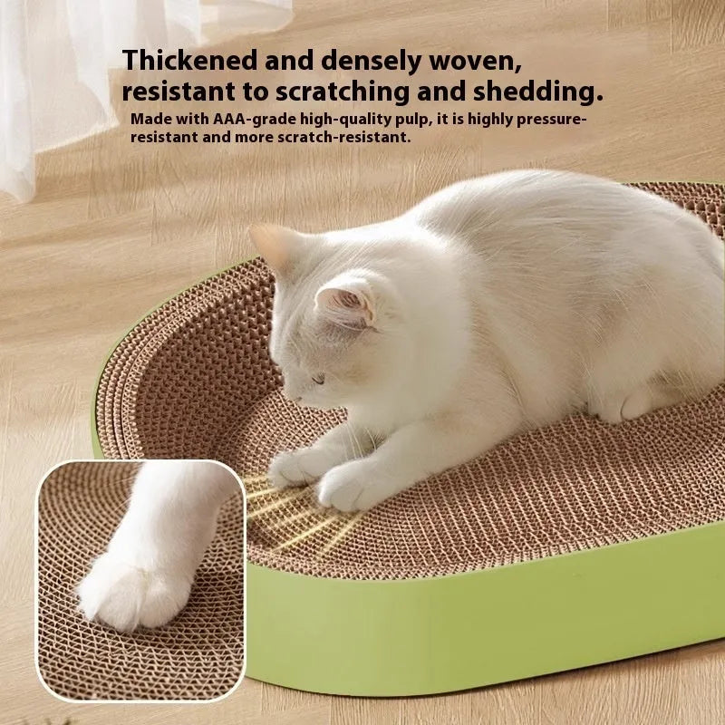 Green oval corrugated paper cat scratch board with a hollow centre forming a nest.
