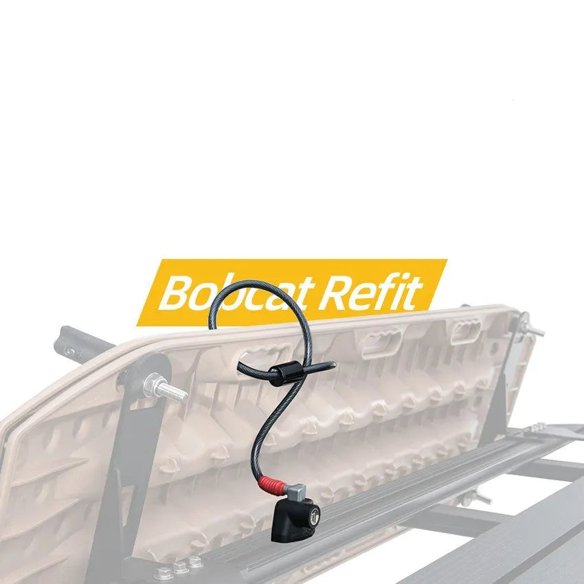 Plastic-sheathed steel cable lock for roof platforms shown securing a kayak.