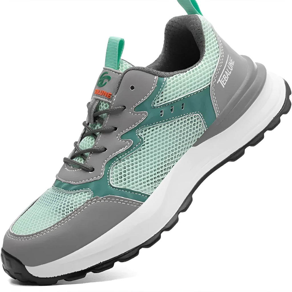 Green low-top work shoes with mesh panels, plastic steel toe caps, and a TPU sole.