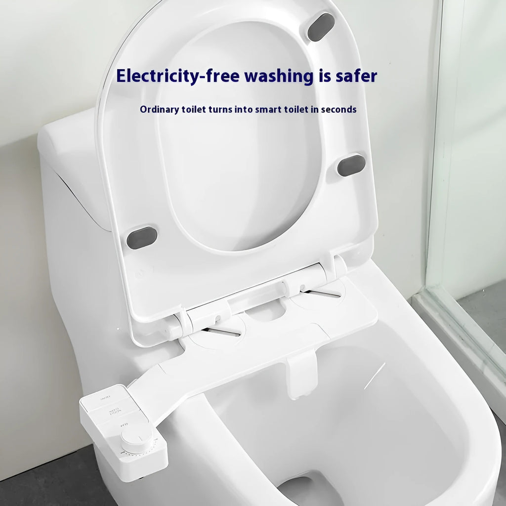 Pure white bidet attachment with button control and detachable nozzle on modern toilet