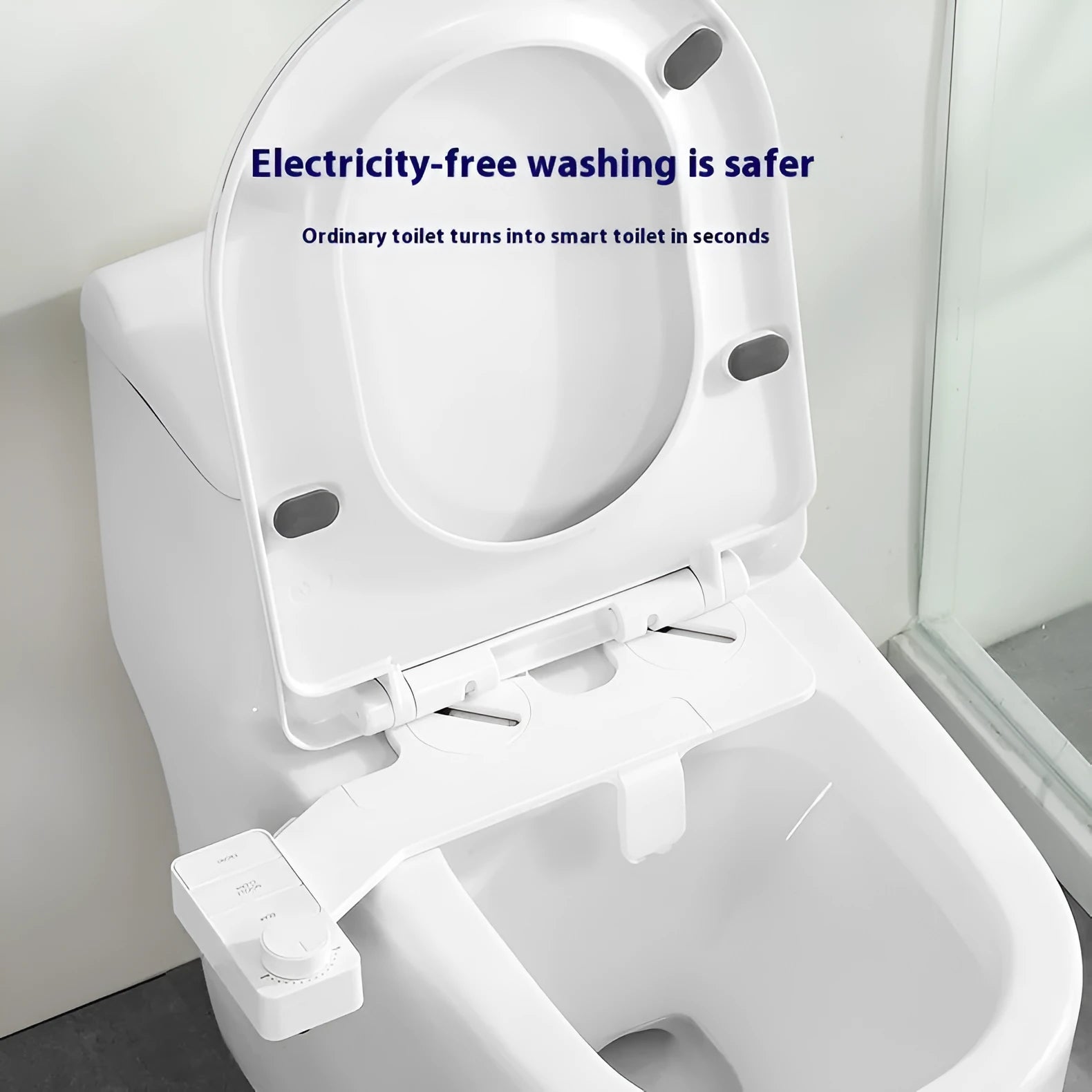 Pure white bidet attachment with button control and detachable nozzle on modern toilet