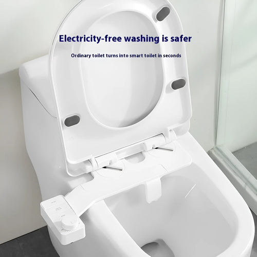 Pure white bidet attachment with button control and detachable nozzle on modern toilet