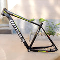 Black green 29-inch aluminium mountain bike frame showing internal cable ports and disc brake mounts
