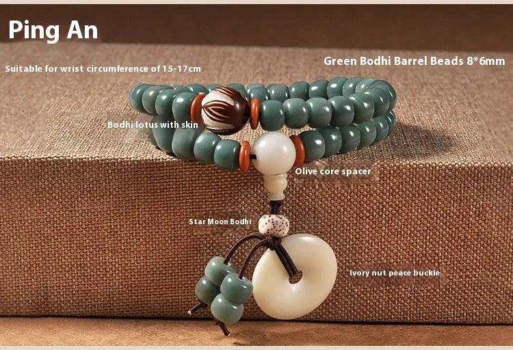 White jade and green sandalwood Bodhi seed bracelet showing either the safety buckle or lotus clasp fastening.