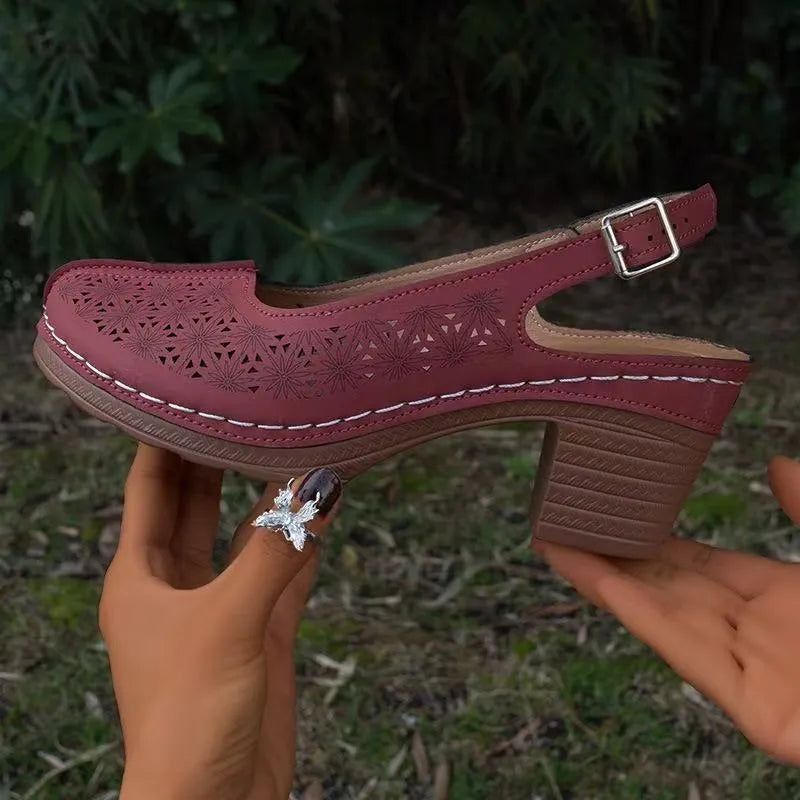 Women's closed toe wedge sandals in wine red colour showing round toe shape and wedge design