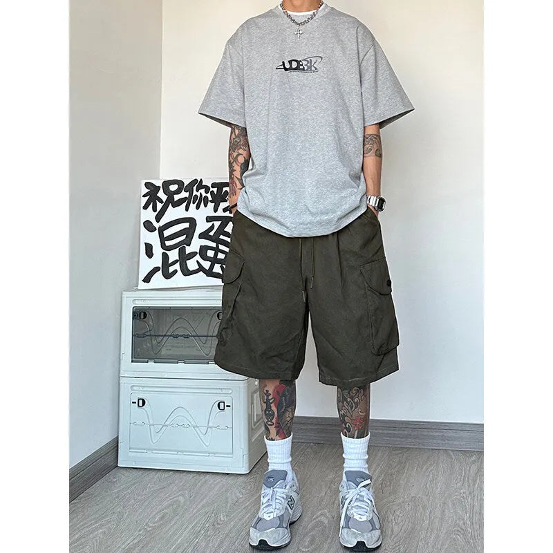 Loose straight-leg casual sports shorts in black, shown in an American-style relaxed fit.