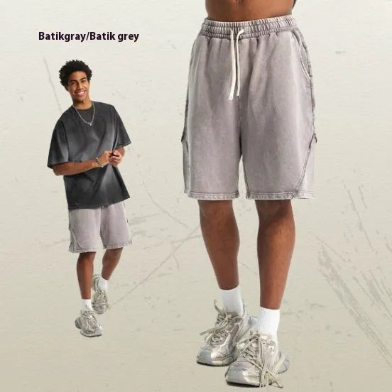 Men's batik washed cotton terry shorts in loose fit, shown in Batik Black colour