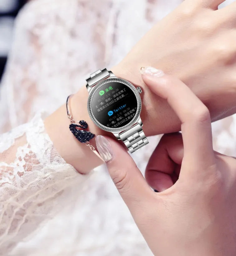 AK38 ladies smart watch with stainless steel Milanese band and 1.09-inch colour screen.